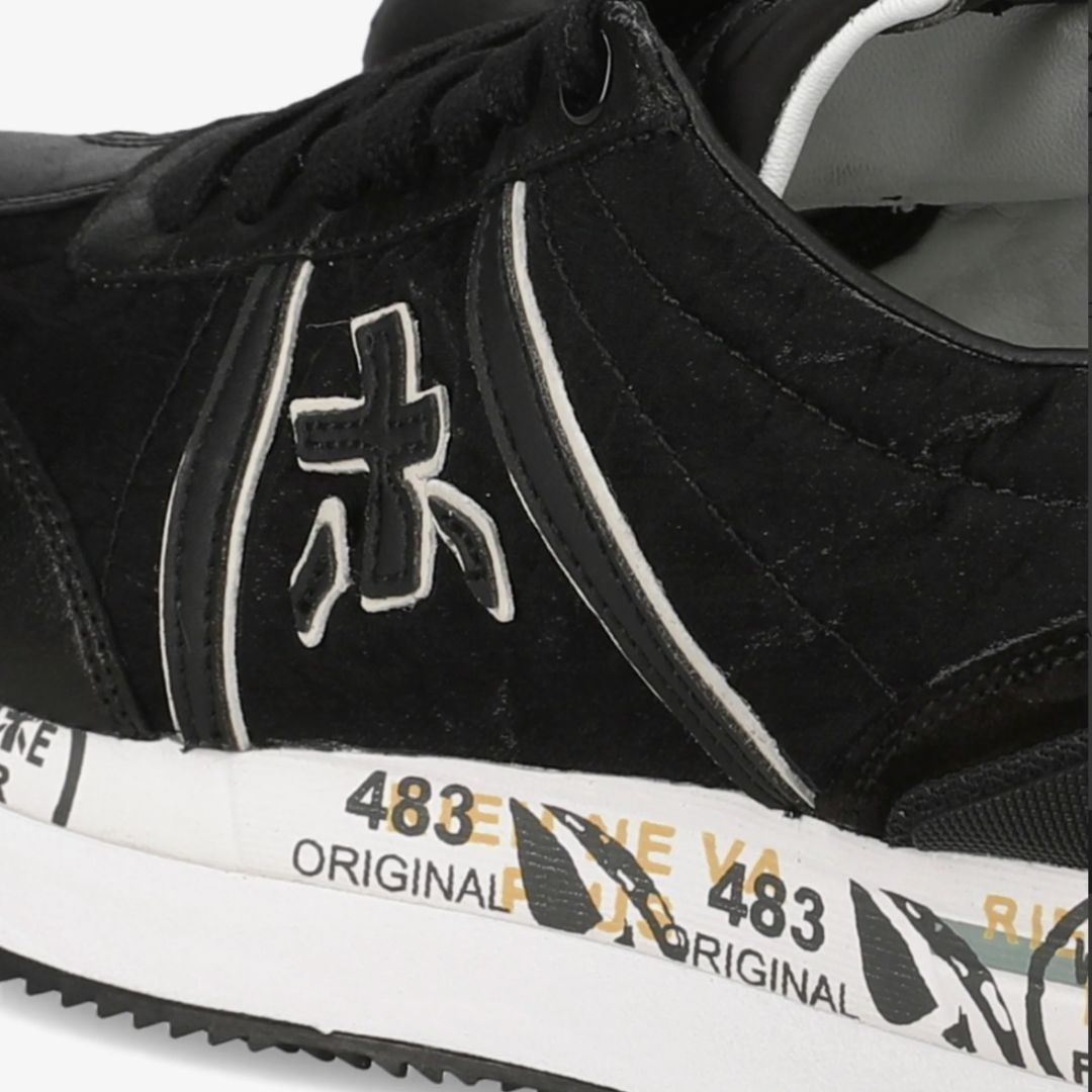4977123