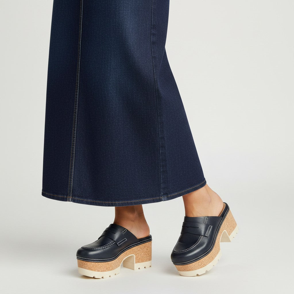 Tretze Shoes navy blue leather clogs with cork platform and white stitching. Open back design.